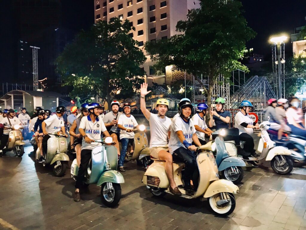 Group transfer by vintage Vespa in Saigon, 100 guests