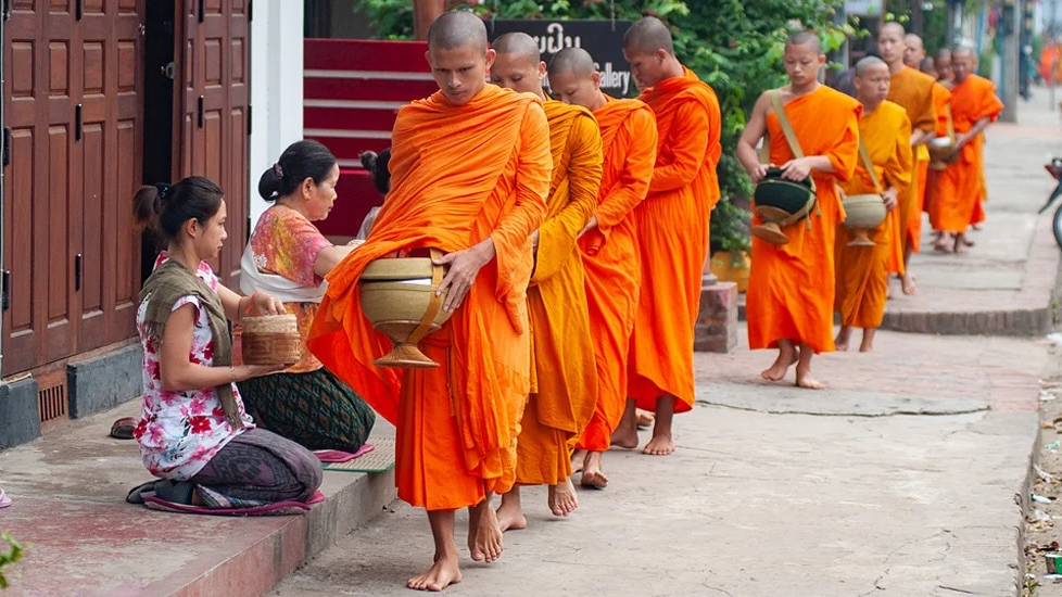 Early-Morning-Alms-Monks-Luang-Prabang-Laos-Copyright-2022-Terence-Carter-Grantourismo-T-